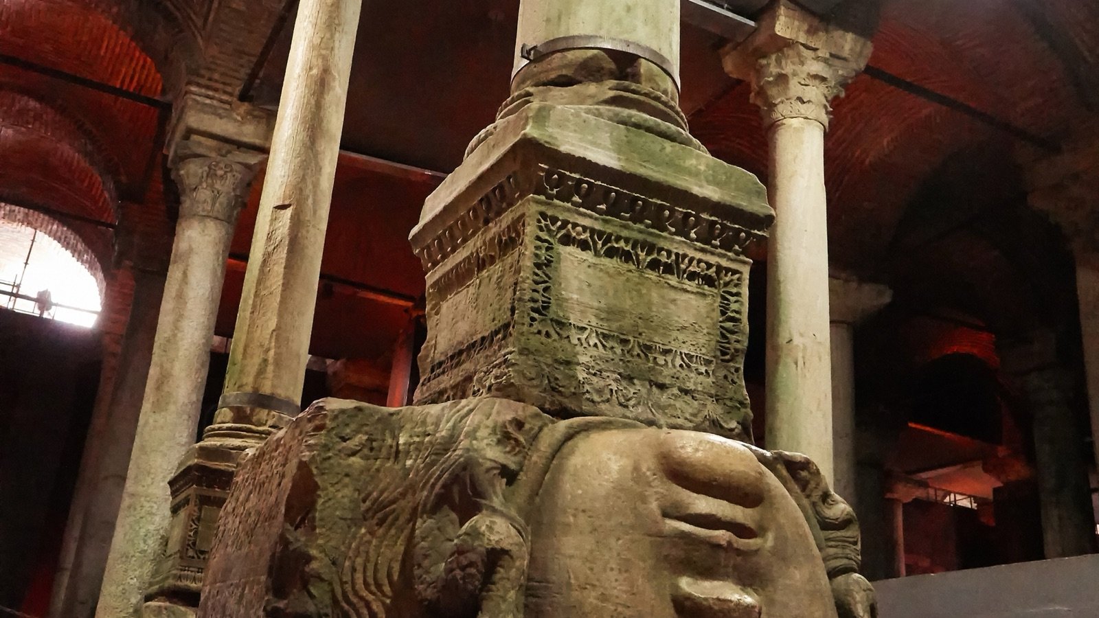 Medusa heads at the base of marble columns