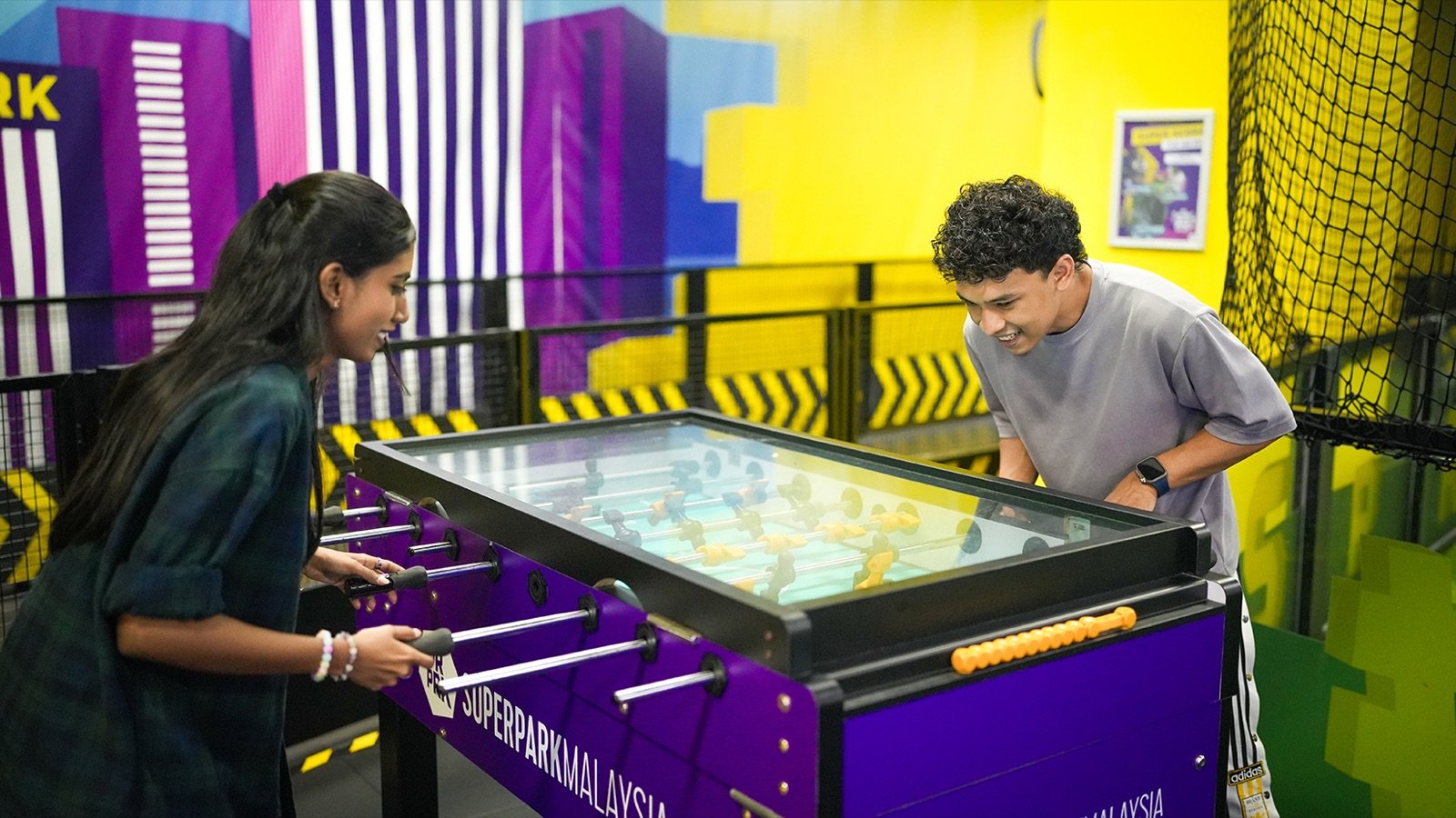 Family playing in the Game Arena