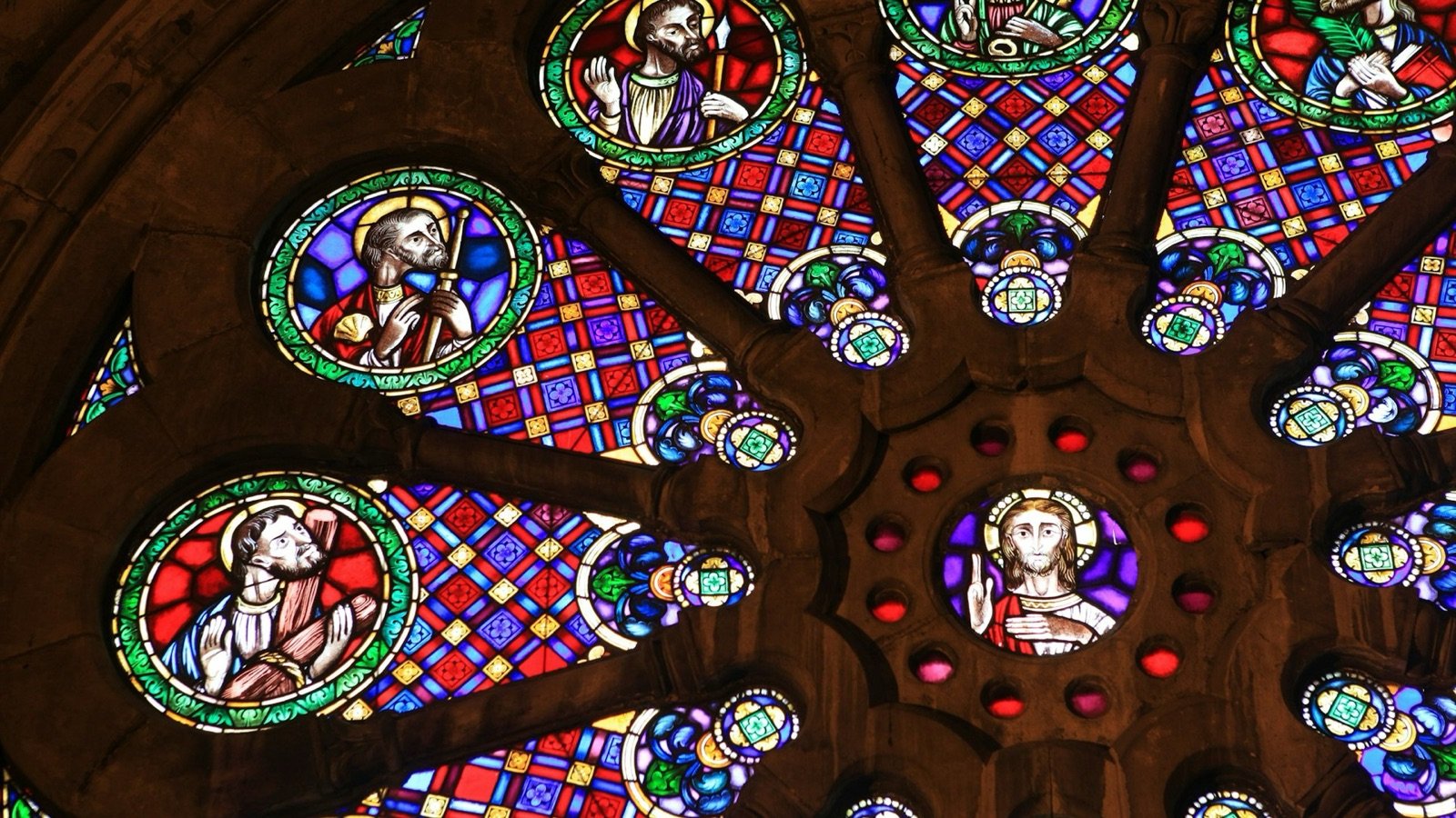 Interior of the cathedral nave with stained-glass windows