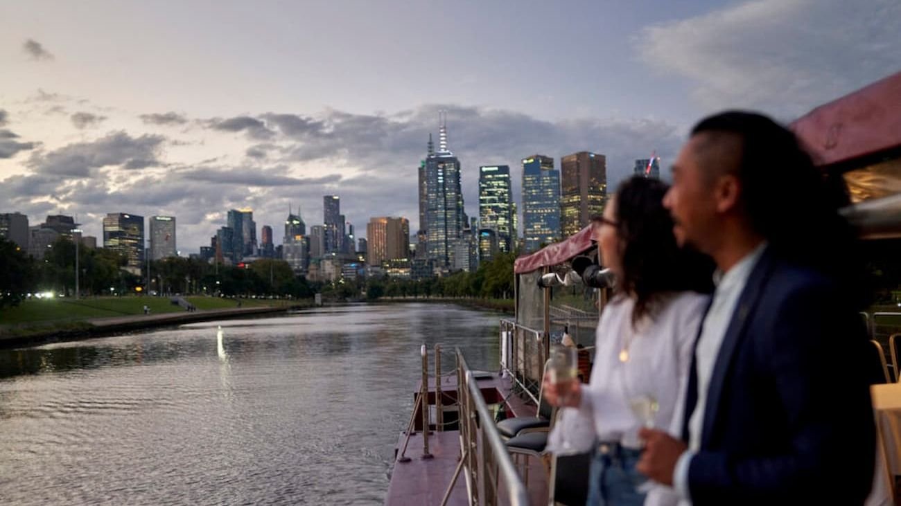 Table dining setup with panoramic windows on the Spirit of Melbourne