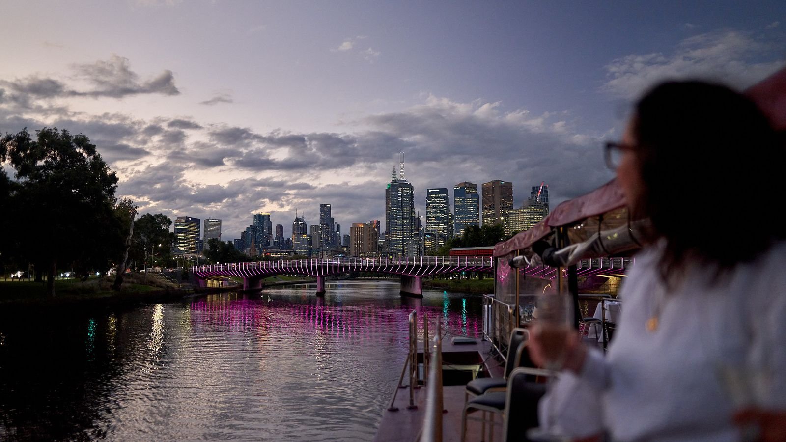Illuminated Melbourne waterfront landmarks viewed from the river