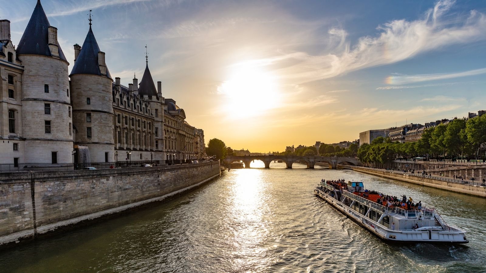 Bateaux Mouches sightseeing boat cruising on the Seine River in Paris