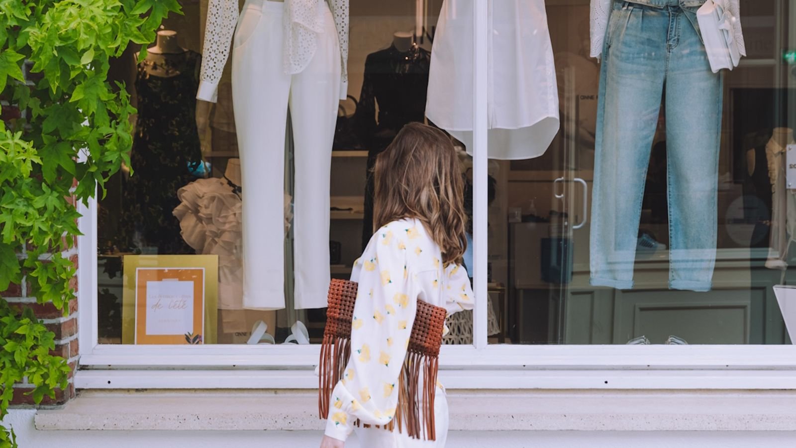 Boutique storefronts featuring French and international fashion brands