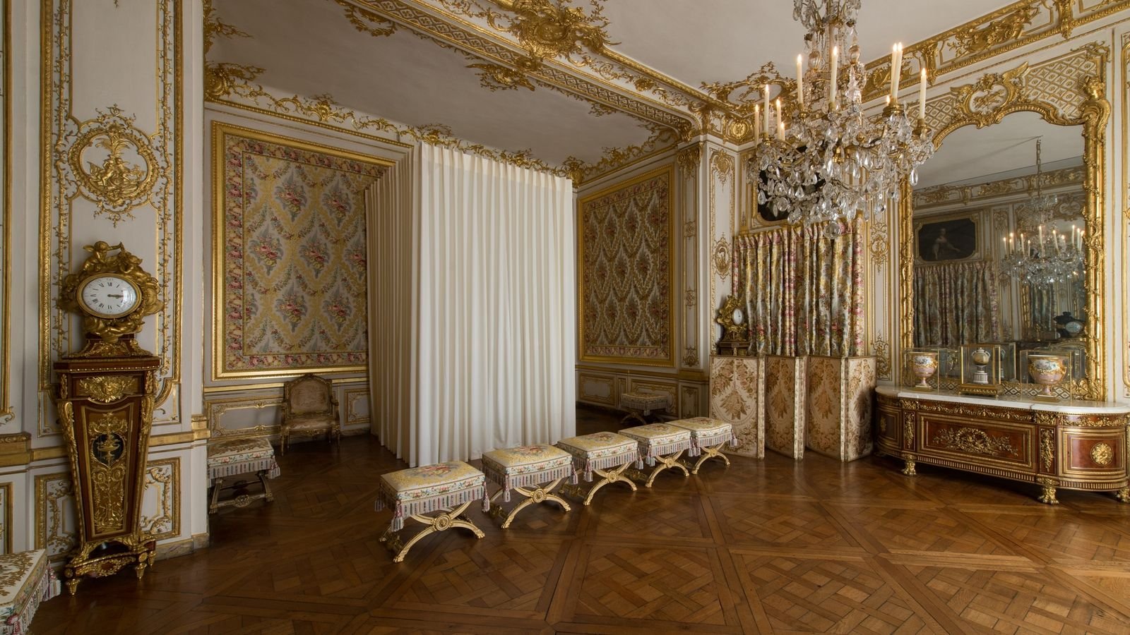 Hall of Mirrors with historic chandeliers and ornate mirrors