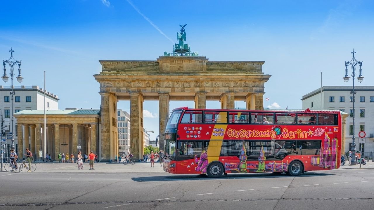 Brandenburg Gate viewed from the open-top deck of a sightseeing bus