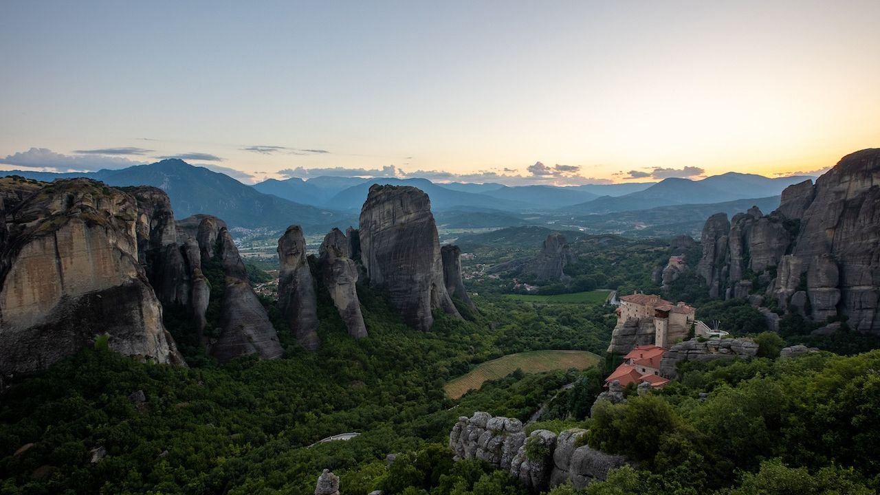 Meteora rock formations rising above the landscape in Thessaly Greece