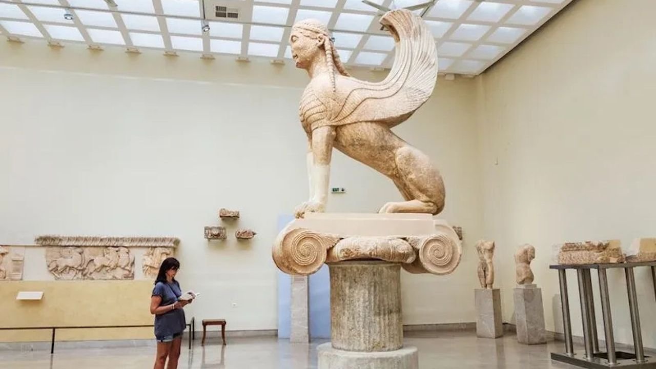 Bronze Charioteer statue displayed inside Delphi Museum