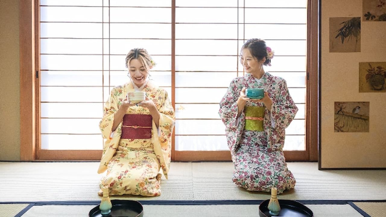 Guest whisking a bowl of matcha during the tea ceremony experience