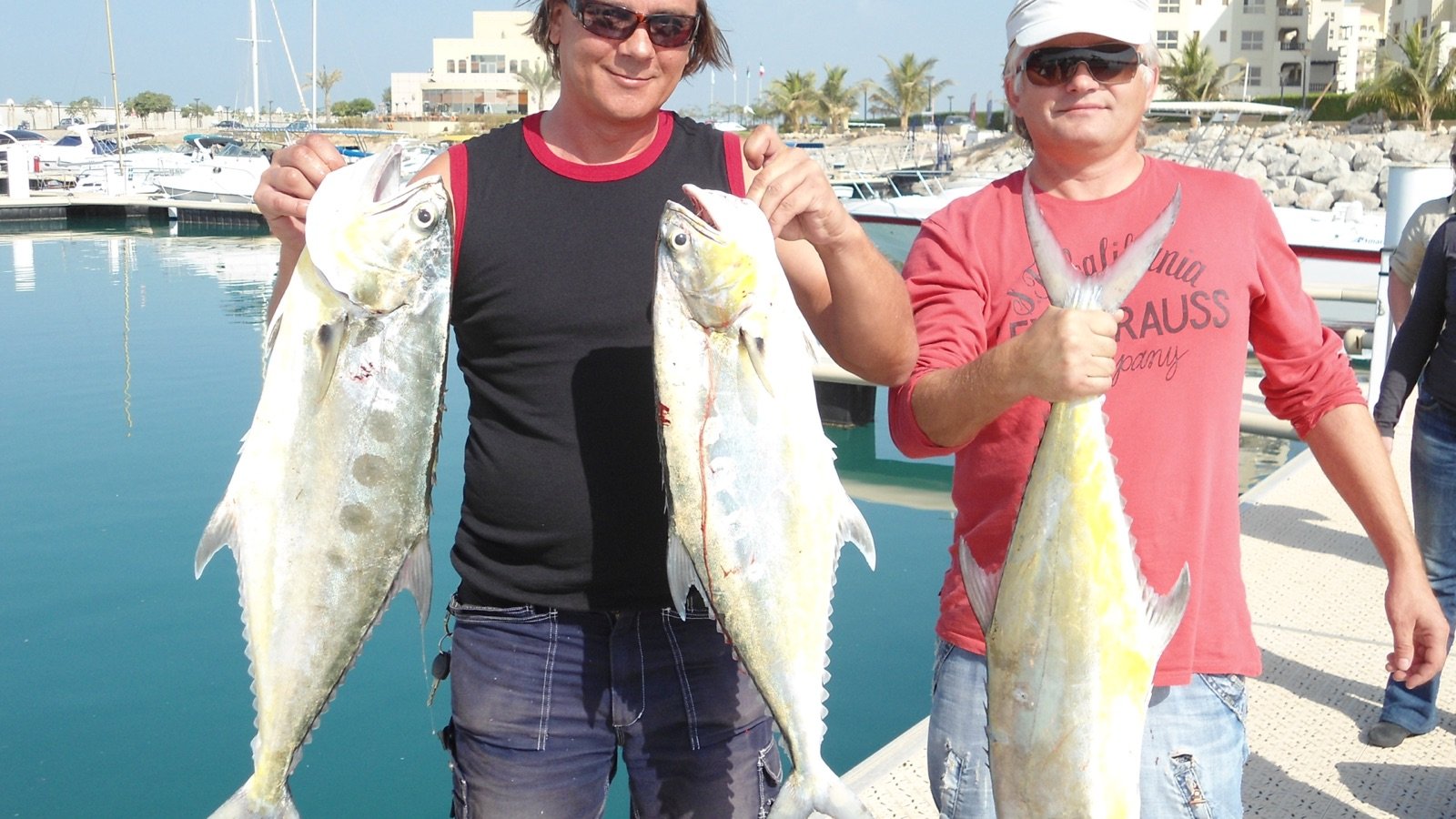 Onboard BBQ setup with fresh fish