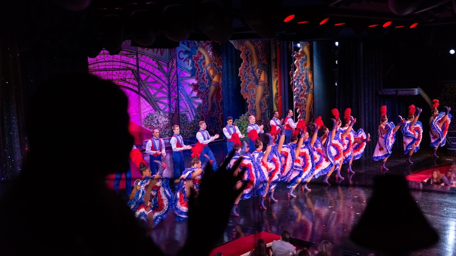 Performers in elaborate costumes during the Fairy cabaret show