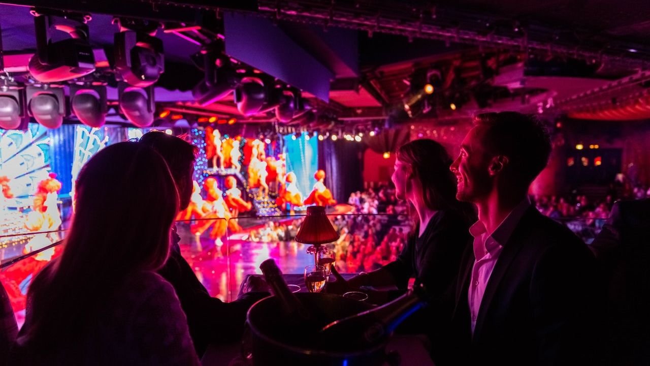 Stage performers dancing at the Moulin Rouge cabaret