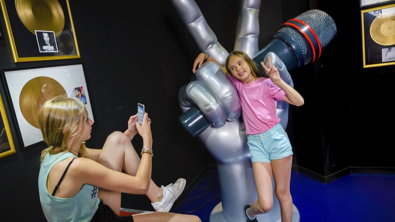 Wax figures arranged in tableaux inside Grévin Wax Museum