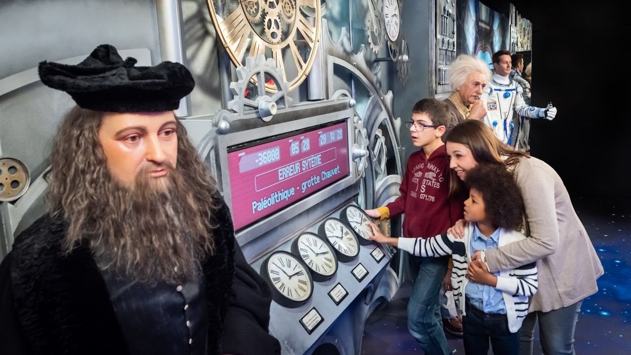Visitors exploring wax displays at Grévin Wax Museum