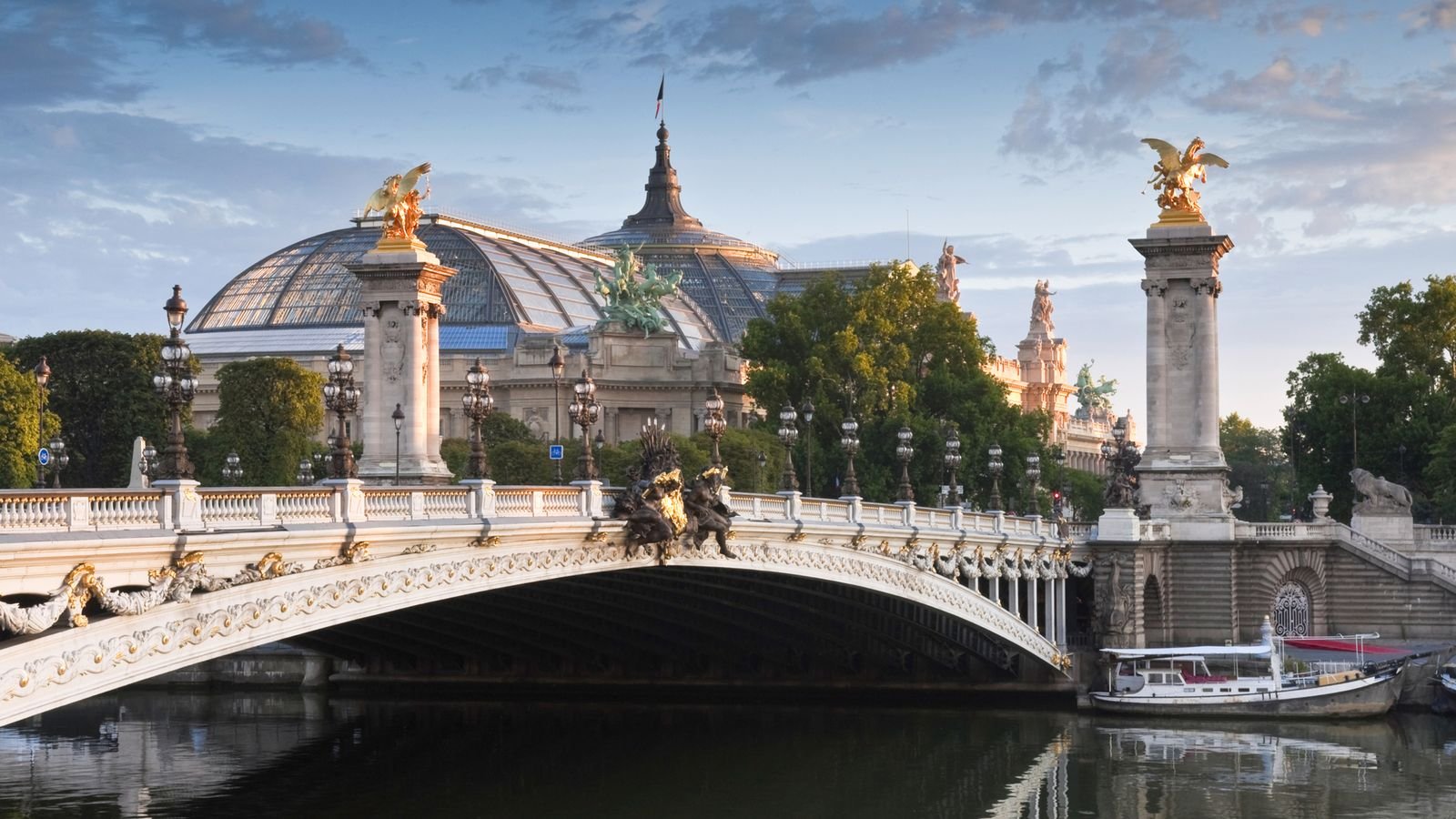 Open-top sightseeing bus touring the streets of Paris