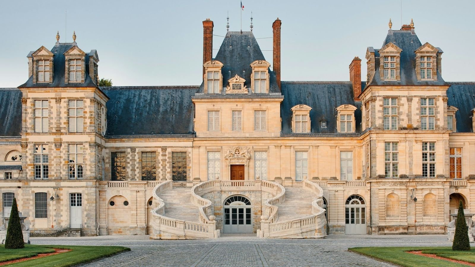 Exterior facade of the historic Château de Fontainebleau in France