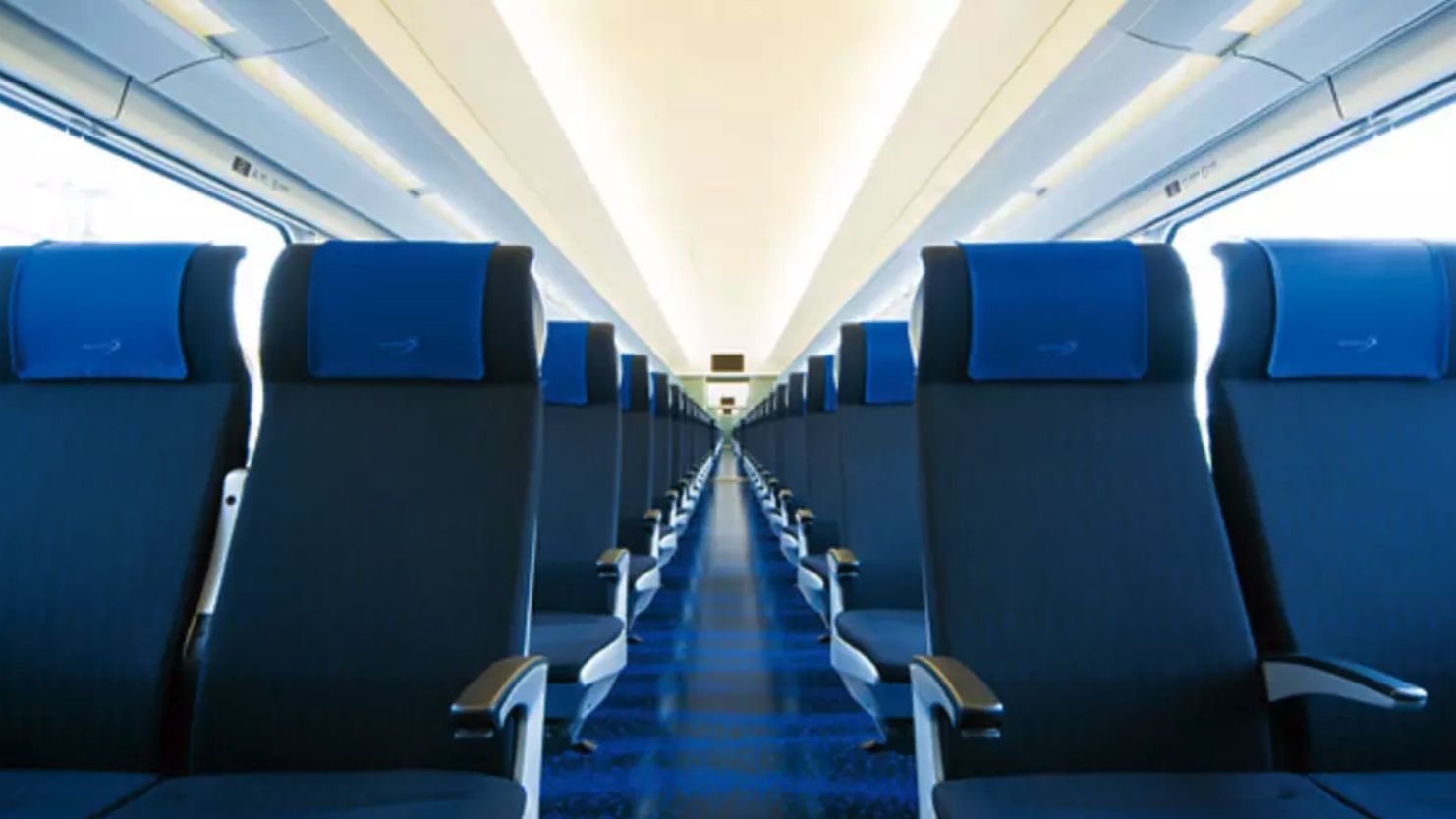 Interior seating inside the Tokyo Keisei Skyliner high-speed train