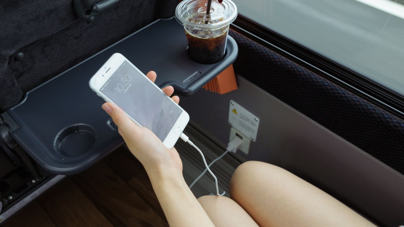 Passenger browsing internet via onboard WiFi