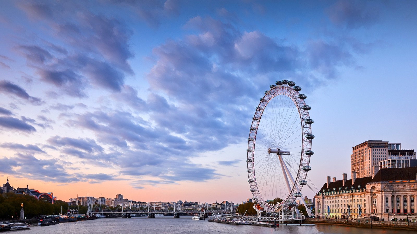 The London Eye observation wheel towering over the River Thames