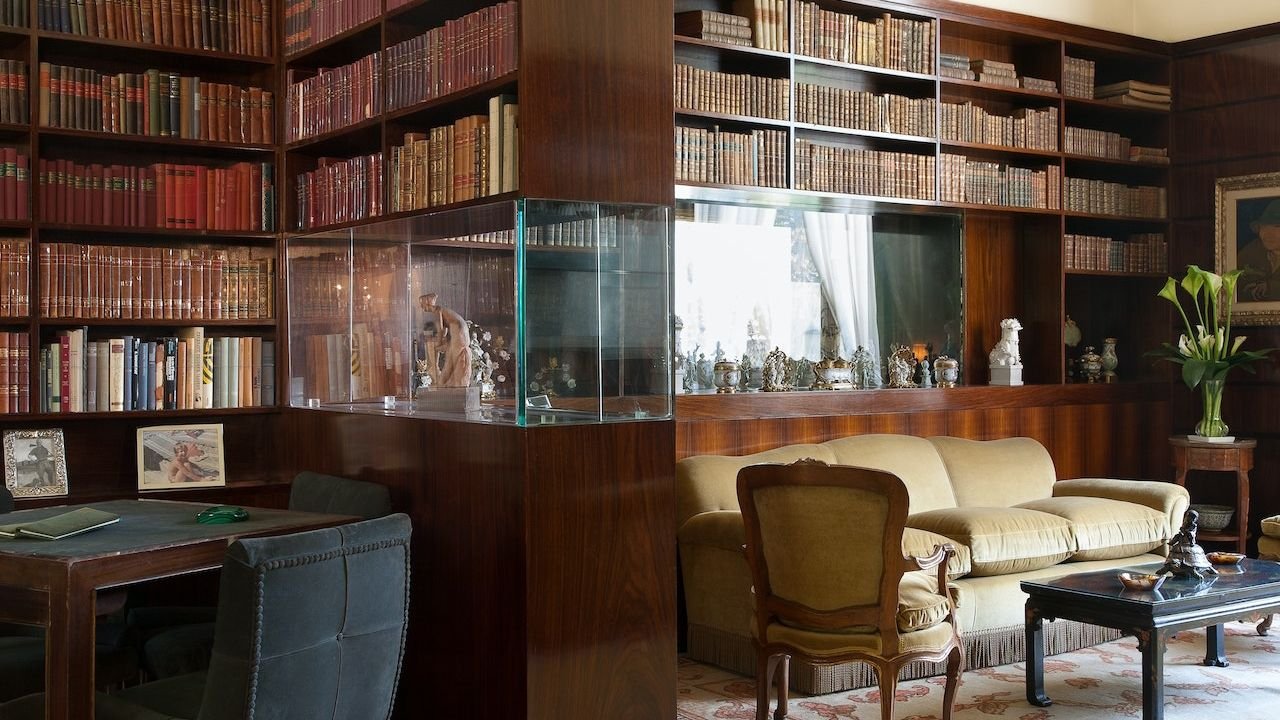 Grand salon interior featuring 1930s decor and furniture