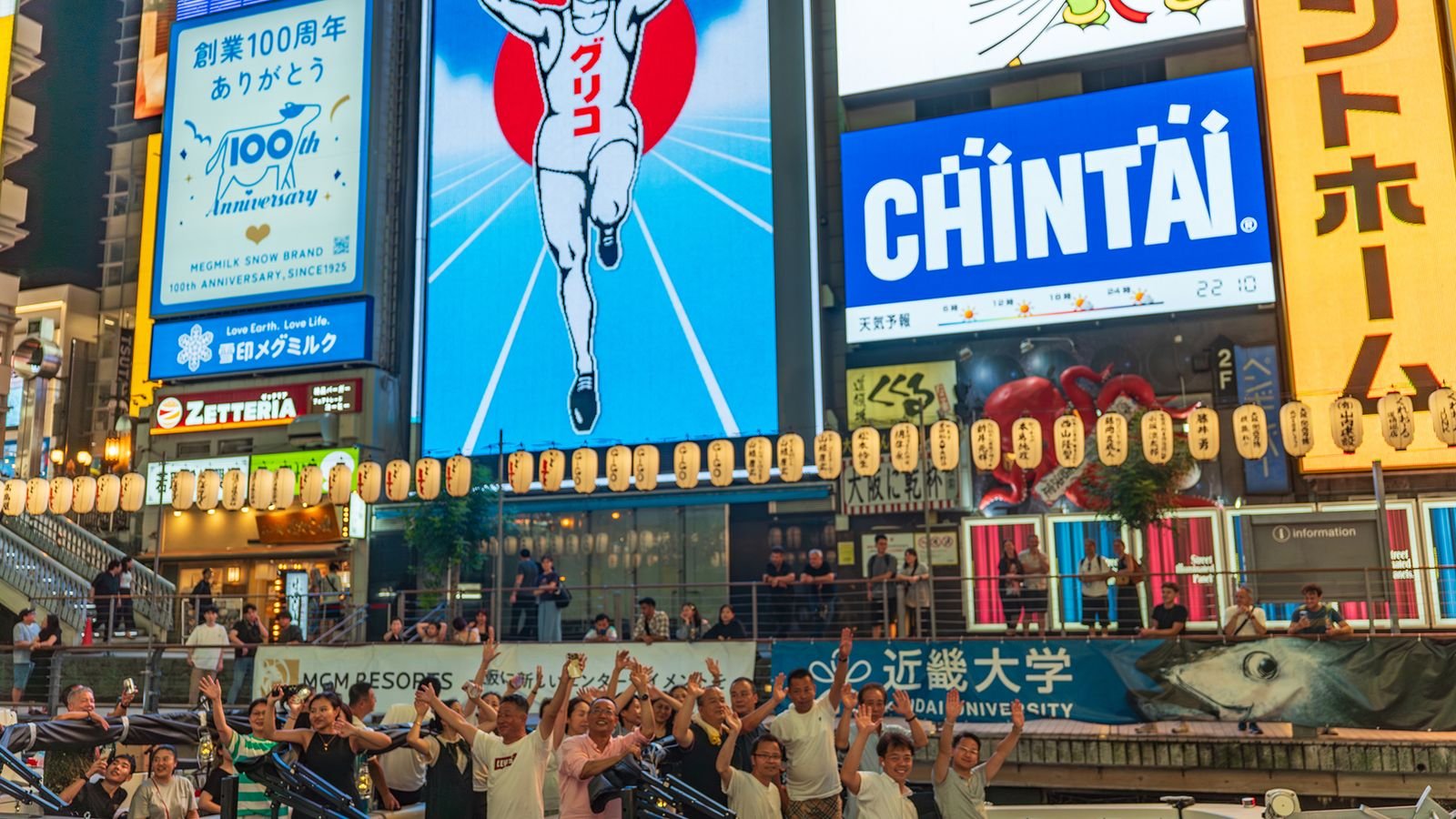 Osaka Dotonbori Naniwa sightseeing cruise boat traveling along the Dotonbori River