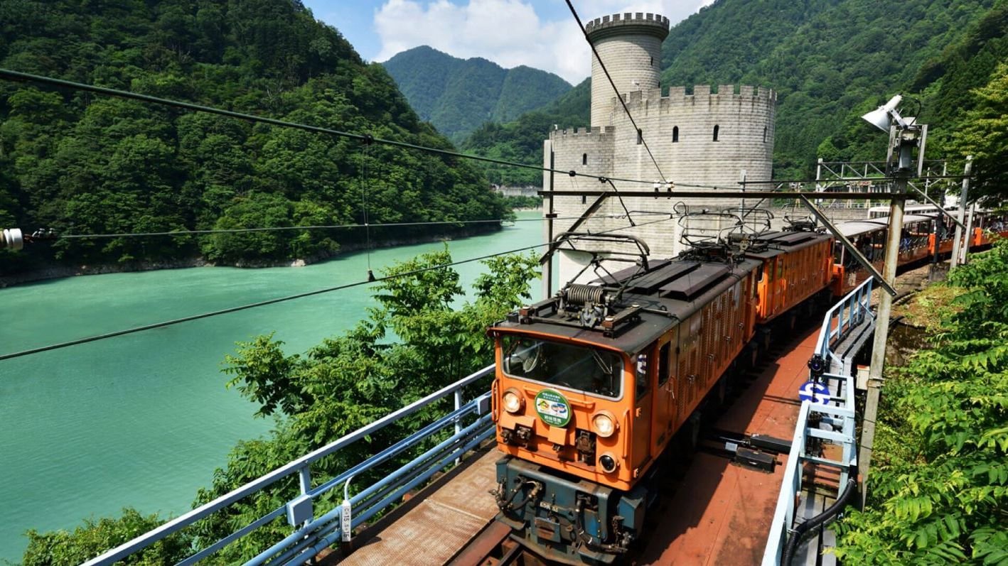Kurobe Gorge Railway train traveling through Toyama Prefecture