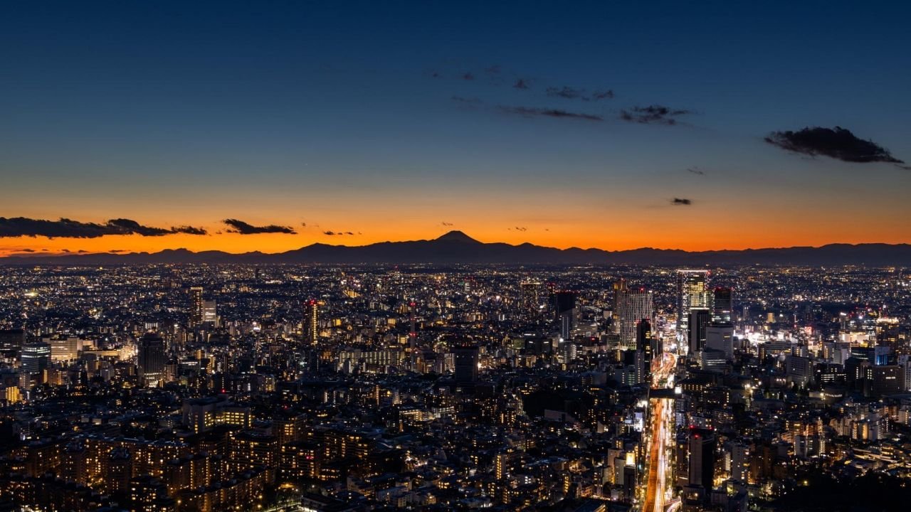 Nighttime cityscape seen from level 52 indoor observation deck