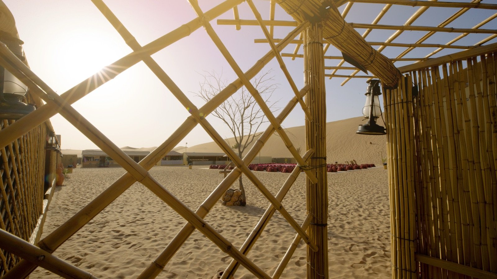 Sandboarding at a traditional desert camp