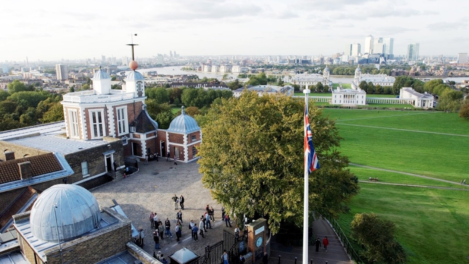 Historic Royal Observatory building and Prime Meridian marker in Greenwich