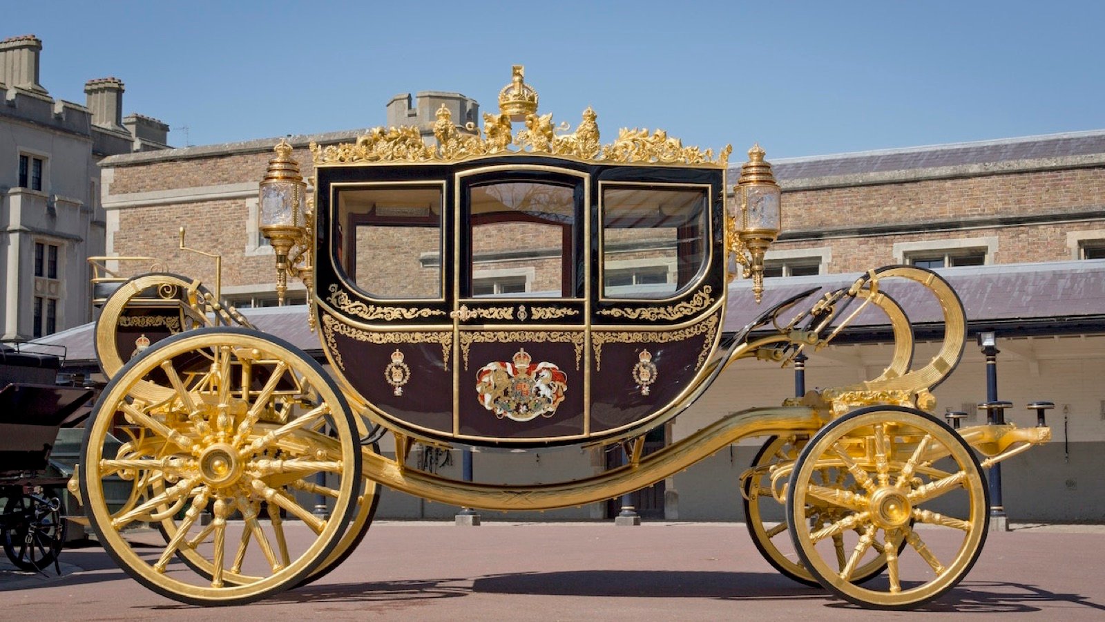 Royal carriages on display at Buckingham Palace Royal Mews