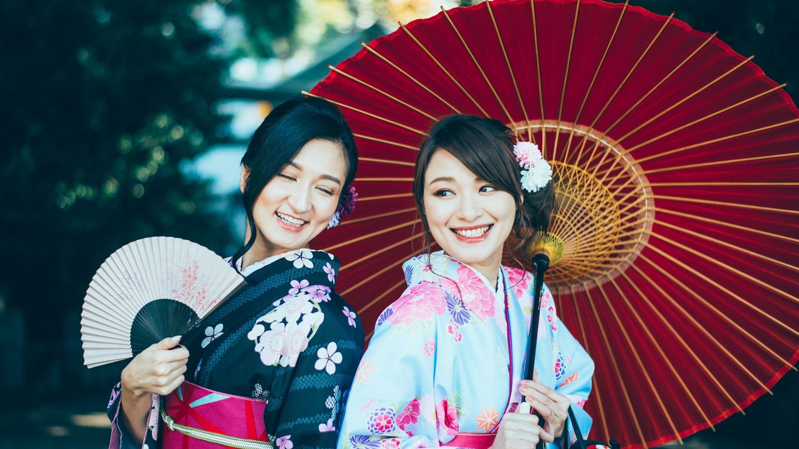 Travelers posing for a private photo shoot in Osaka