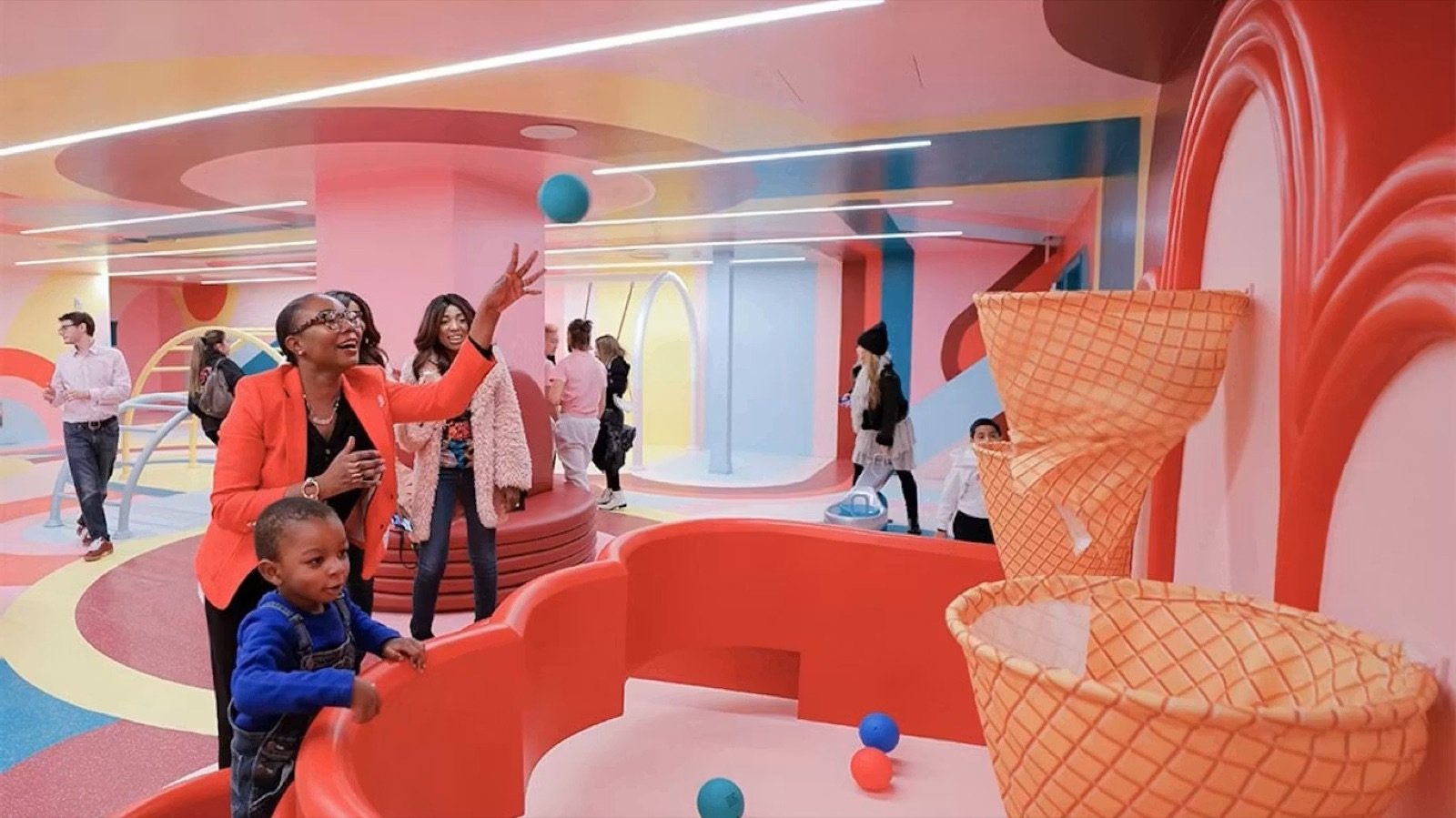 Multi-floor colorful exhibit space at Museum of Ice Cream New York