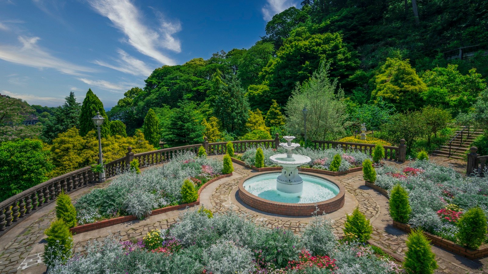 Acao Forest themed garden with seasonal flowers