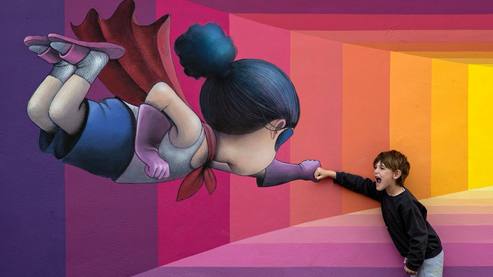 Large-scale outdoor street art mural at Wynwood Walls Miami