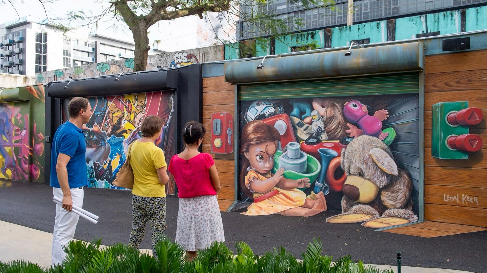 Sculptures and colorful murals in the Wynwood Walls courtyard