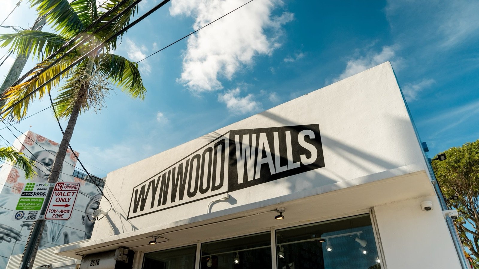 Hands-on spray painting activity wall at Wynwood Walls Miami