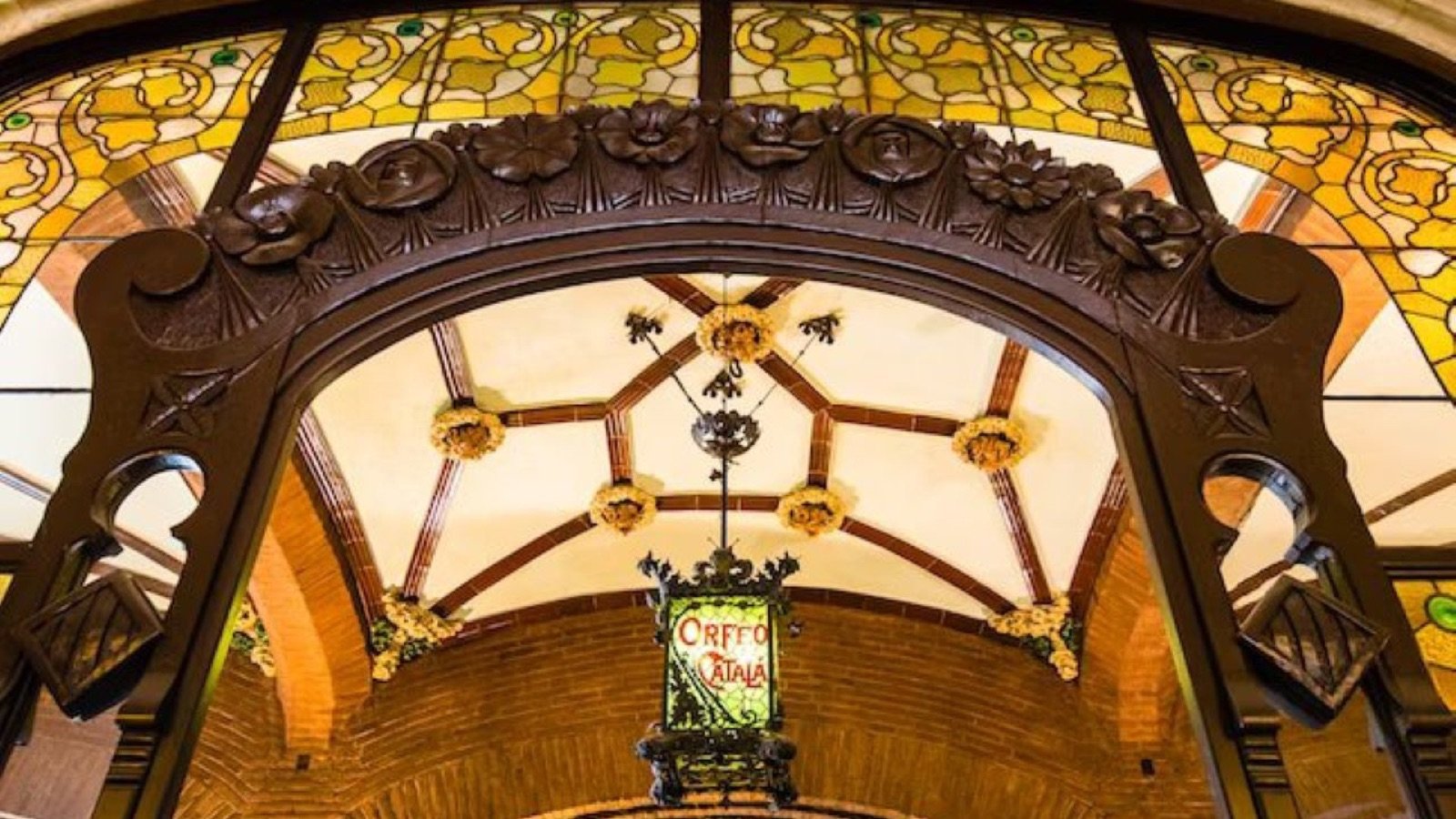 Sculpture and mosaic artwork within the Catalan Art Nouveau concert hall