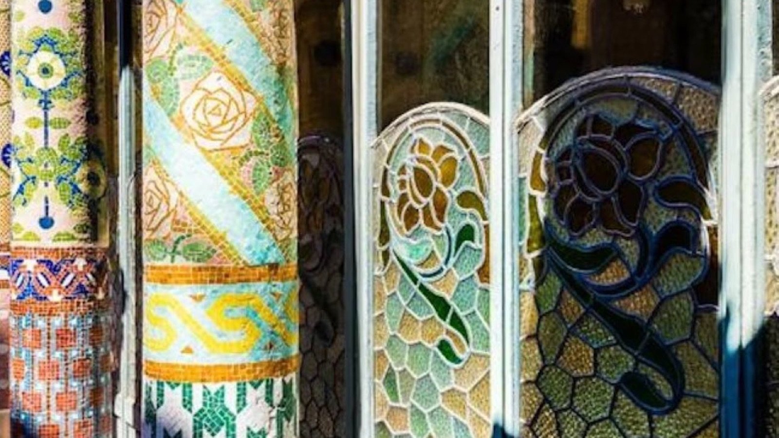 Visitors exploring Palau de la Música Catalana on an English guided tour