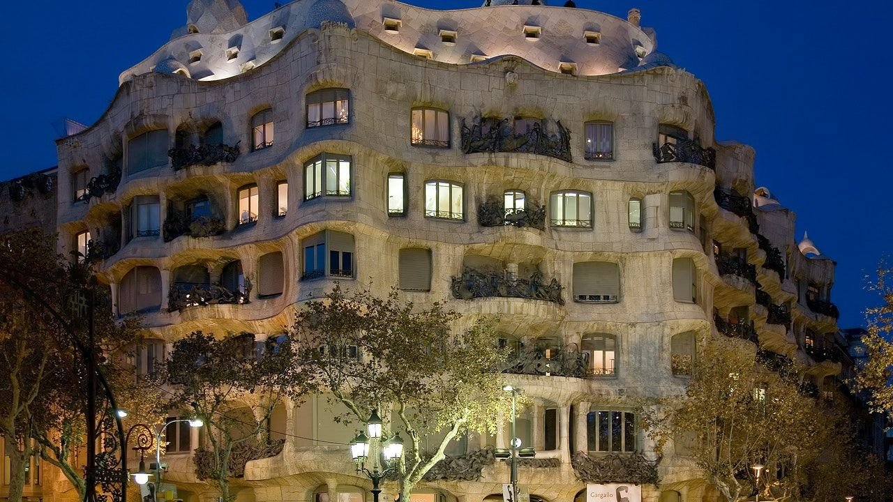 Open courtyard with murals inside Casa Mila