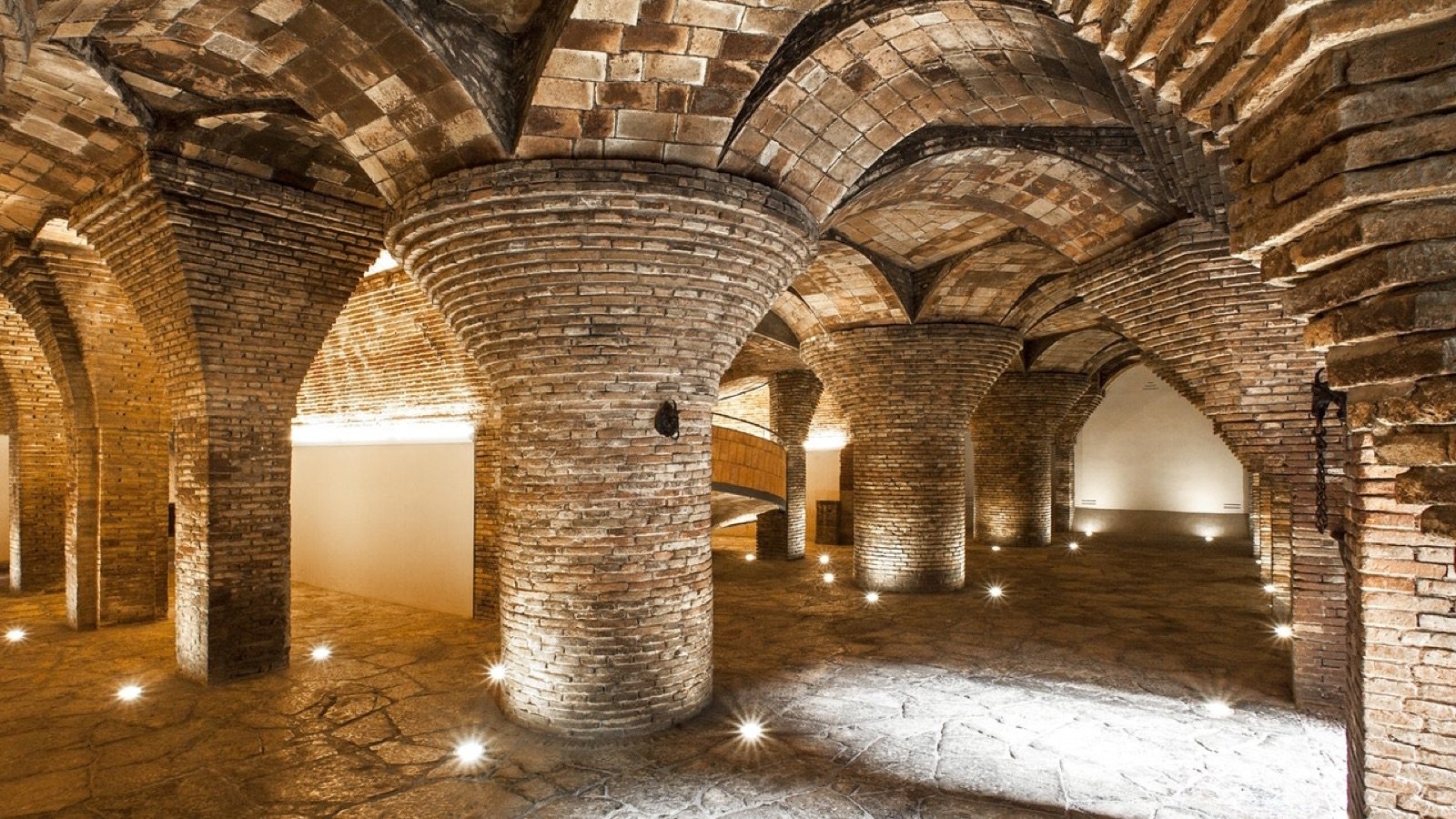 Palau Güell rooftop terrace featuring sculpted chimneys