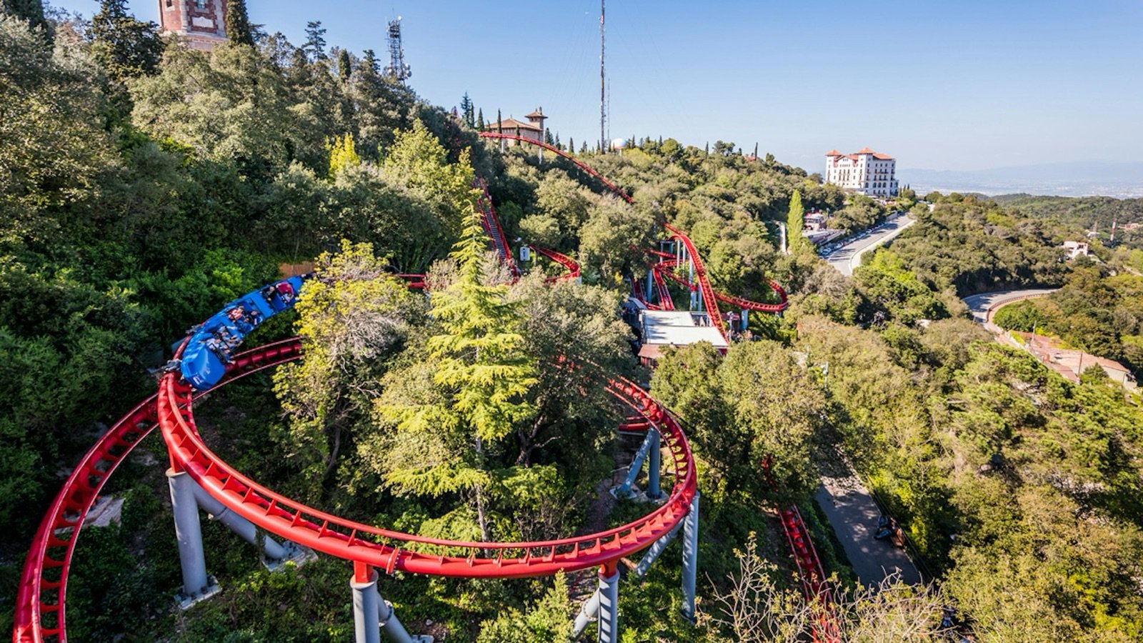 Rollercoaster and vintage attractions at Tibidabo Amusement Park