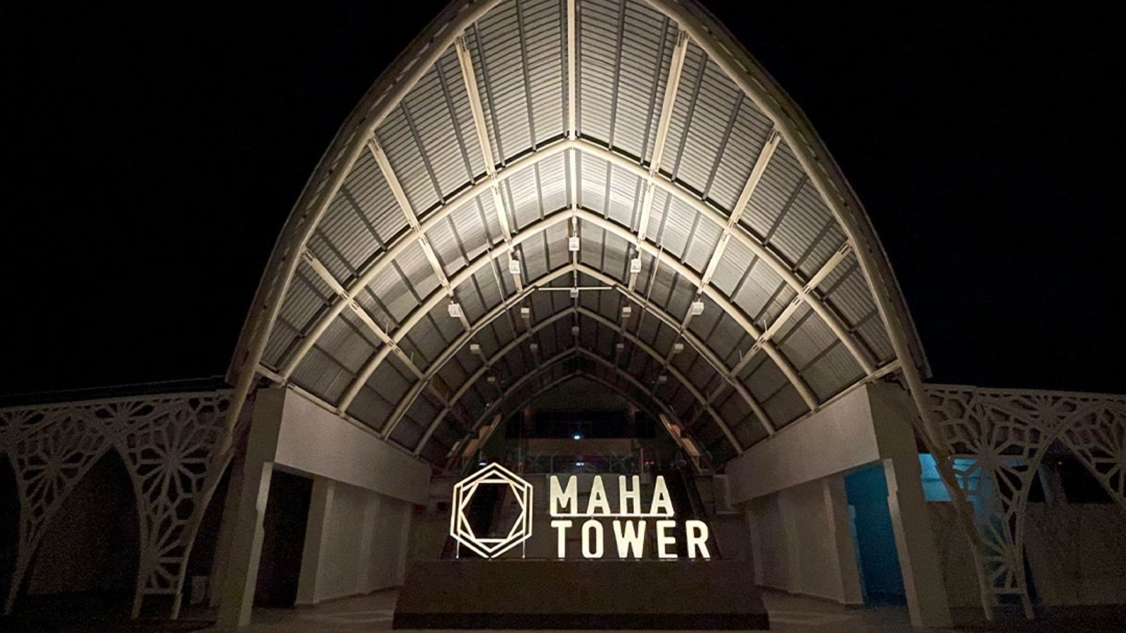 Visitors looking down through Maha Tower glass floor