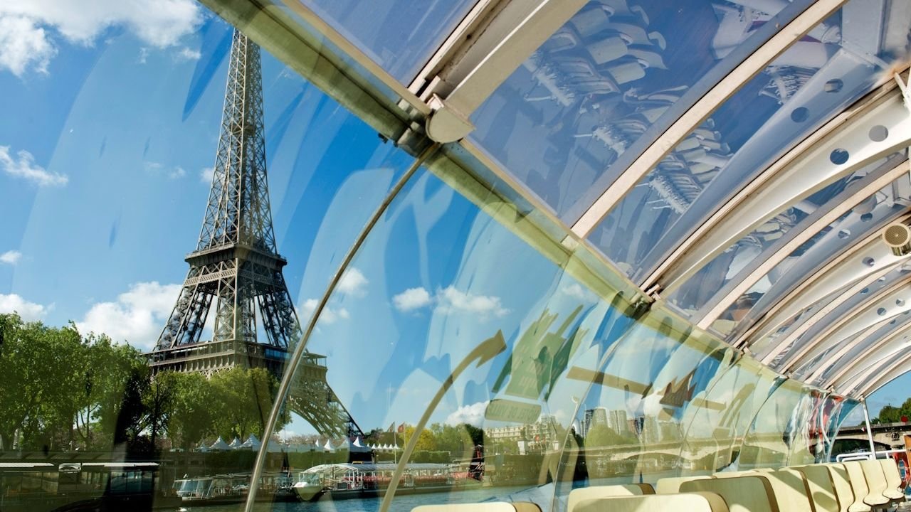 Passengers boarding Batobus riverboat near the Louvre museum