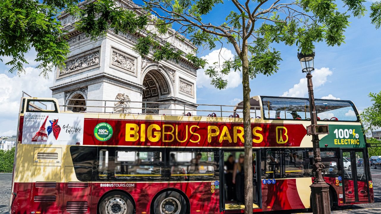 Big Bus Paris tour bus near the Eiffel Tower